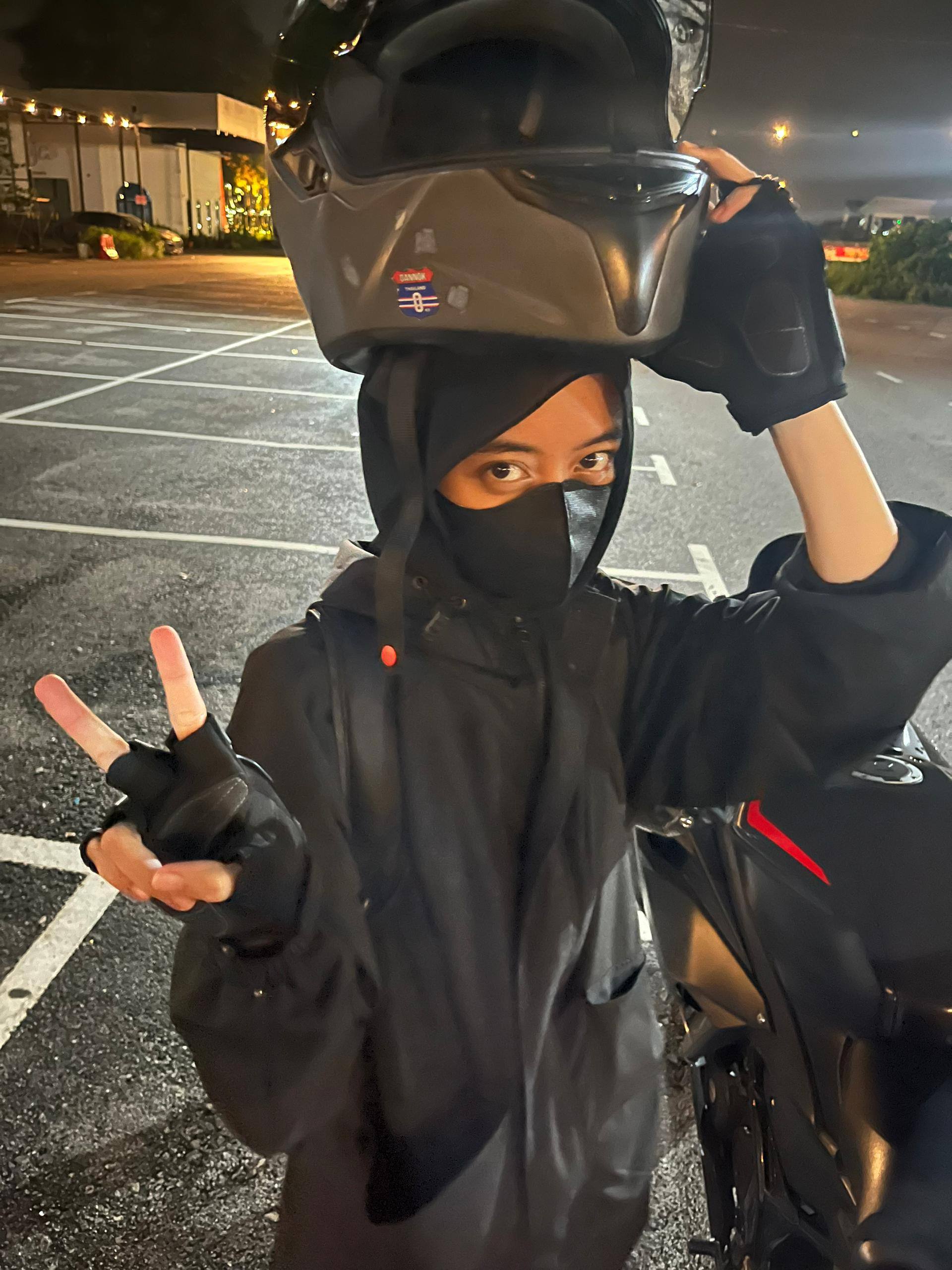 Biker girl with motorcycles